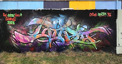 Colorful and Black Stylewriting by Utopia. This Graffiti is located in Radebeul, Germany and was created in 2022. This Graffiti can be described as Stylewriting and Wall of Fame.