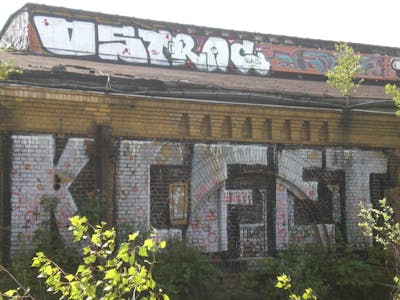 Chrome Stylewriting by urine, OST, RAC, KCF and ET. This Graffiti is located in Leipzig, Germany and was created in 2010. This Graffiti can be described as Stylewriting, Abandoned and Street Bombing.
