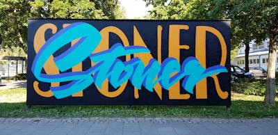 Light Blue and Orange Handstyles by Stoner. This Graffiti is located in Germany and was created in 2019. This Graffiti can be described as Handstyles and Stylewriting.