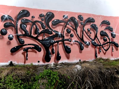 Black and Coralle Stylewriting by Kezam. This Graffiti is located in Auckland, New Zealand and was created in 2022. This Graffiti can be described as Stylewriting, 3D and Handstyles.