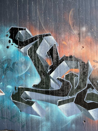 Grey and Cyan and Orange Stylewriting by Kardo. This Graffiti is located in stuttgart, Germany and was created in 2024.
