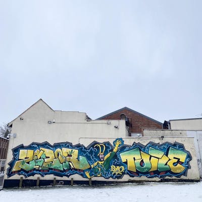 Beige and Cyan and Blue Stylewriting by Zebor, smo__crew and Toile. This Graffiti is located in Wolverhampton, United Kingdom and was created in 2022. This Graffiti can be described as Stylewriting and Characters.