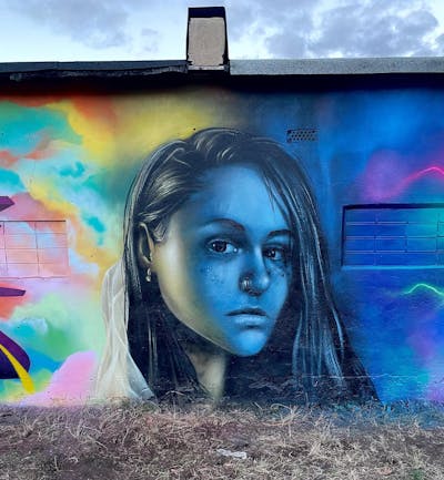 Colorful Characters by AIDN and New Cru. This Graffiti is located in Ludwigsfelde, Germany and was created in 2022. This Graffiti can be described as Characters.