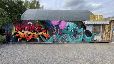 Colorful and Red and Cyan Stylewriting by Picks and Diro. This Graffiti is located in Hettstedt, Germany and was created in 2023. This Graffiti can be described as Stylewriting and Characters.