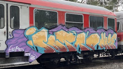 Beige and Violet and Cyan Stylewriting by MKSF, Intro and Strikingfaces87. This Graffiti is located in Germany and was created in 2023. This Graffiti can be described as Stylewriting and Trains.