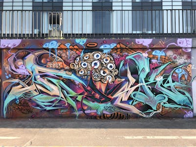 Colorful Stylewriting by Fresk. This Graffiti is located in Poznan, Poland and was created in 2023. This Graffiti can be described as Stylewriting, Characters and Wall of Fame.