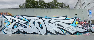 Chrome and Light Blue Stylewriting by Riots. This Graffiti is located in Prague, Czech Republic and was created in 2022. This Graffiti can be described as Stylewriting and Street Bombing.