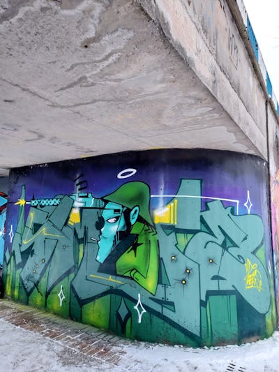 Green and Violet Stylewriting by Fems173. This Graffiti is located in lublin, Poland and was created in 2023. This Graffiti can be described as Stylewriting, Characters and Wall of Fame.