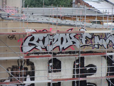 Chrome and Black and Coralle Stylewriting by rizok, R120K, bros and shrek. This Graffiti is located in Leipzig, Germany and was created in 2012. This Graffiti can be described as Stylewriting and Street Bombing.