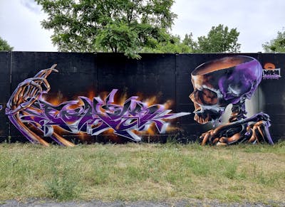 Orange and Violet Stylewriting by FOKUS.81 and Norm. This Graffiti is located in Darmstadt, Germany and was created in 2021. This Graffiti can be described as Stylewriting and Characters.