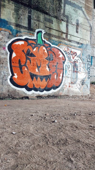 Orange and Black Stylewriting by Cimet. This Graffiti is located in Zagreb, Croatia and was created in 2022. This Graffiti can be described as Stylewriting, Characters and Abandoned.