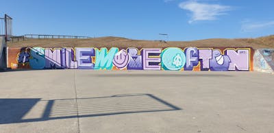 Coralle and Cyan and Colorful Stylewriting by Sky High and smo__crew. This Graffiti is located in London, United Kingdom and was created in 2022. This Graffiti can be described as Stylewriting and Characters.