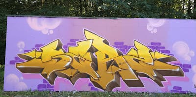 Orange and Violet and Brown Stylewriting by Serz. This Graffiti is located in Assen, Netherlands and was created in 2023.