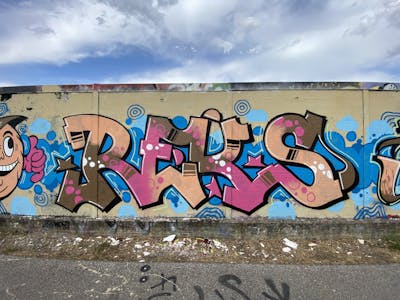 Colorful Stylewriting by REKS. This Graffiti is located in Bologna, Italy and was created in 2021. This Graffiti can be described as Stylewriting and Wall of Fame.