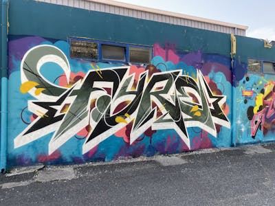 White and Colorful Stylewriting by Fyre666. This Graffiti is located in Lisboa, Portugal and was created in 2023. This Graffiti can be described as Stylewriting and Wall of Fame.