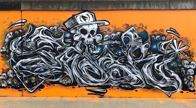 Orange and Grey and Black Stylewriting by Fresk. This Graffiti is located in Poznan, Poland and was created in 2023. This Graffiti can be described as Stylewriting, Characters and Wall of Fame.