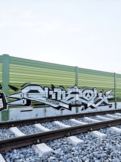 Black and White Stylewriting by bros, rizok and R120K. This Graffiti is located in Leipzig, Germany and was created in 2020. This Graffiti can be described as Stylewriting and Line Bombing.