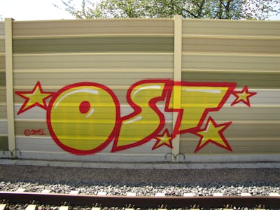 Red and Yellow Stylewriting by urine, Pizar and OST. This Graffiti is located in Leipzig, Germany and was created in 2016. This Graffiti can be described as Stylewriting and Street Bombing.