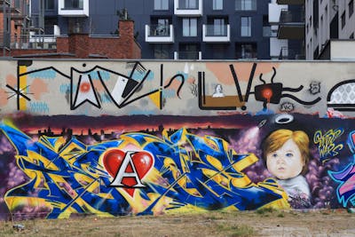 Blue and Colorful Stylewriting by Temps1. This Graffiti is located in Poland and was created in 2022. This Graffiti can be described as Stylewriting, Characters and Wall of Fame.