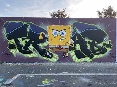 Colorful Stylewriting by Trab One. This Graffiti is located in Oschatz, Germany and was created in 2022. This Graffiti can be described as Stylewriting, Characters and Wall of Fame.