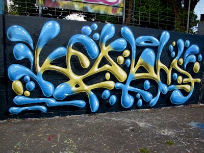 Light Blue and Yellow and Black Stylewriting by Kezam. This Graffiti is located in Auckland, New Zealand and was created in 2023. This Graffiti can be described as Stylewriting and 3D.
