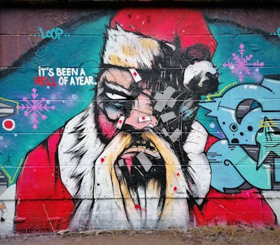 Red and White and Cyan Characters by Bad Seeds and Loop. This Graffiti is located in Finland and was created in 2022.