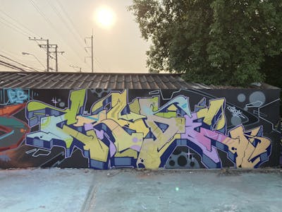 Colorful and Blue Stylewriting by Crude. This Graffiti is located in Bangkok, Thailand and was created in 2021.