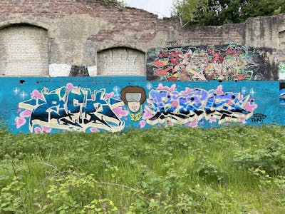 Colorful Stylewriting by ZICK, PMZ CREW and BERS. This Graffiti is located in Oldenburg, Germany and was created in 2022. This Graffiti can be described as Stylewriting, Characters and Abandoned.