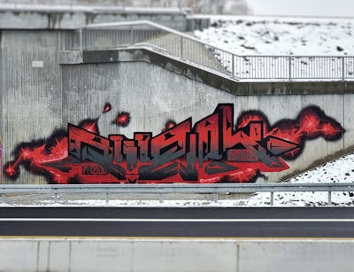 Red and Grey and Black Stylewriting by rizok, R120K and bros. This Graffiti is located in Leipzig, Germany and was created in 2022. This Graffiti can be described as Stylewriting and Street Bombing.