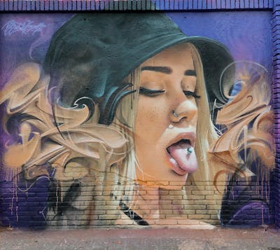 Beige and Violet Stylewriting by Bublegum. This Graffiti is located in Barcelona, Spain and was created in 2021. This Graffiti can be described as Stylewriting, Characters, Murals and 3D.
