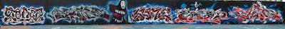 Red and White and Blue Stylewriting by ASPIRE, seyer, Chips, Sorez and sone. This Graffiti is located in London, United Kingdom and was created in 2022. This Graffiti can be described as Stylewriting, Characters and Wall of Fame.