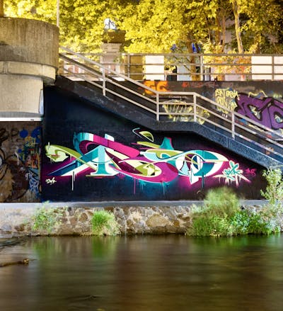 Colorful Stylewriting by Syck, ABS, KKP and Los Capitanos. This Graffiti is located in Freiburg, Germany and was created in 2019.