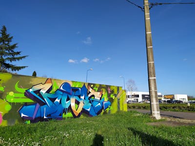 Blue and Colorful Stylewriting by CDB, MCT, BK and Noack. This Graffiti is located in Montauban, France and was created in 2020. This Graffiti can be described as Stylewriting and Wall of Fame.
