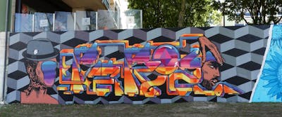Colorful Stylewriting by Pariz One and Pariz. This Graffiti is located in LISBON, Portugal and was created in 2021. This Graffiti can be described as Stylewriting, Characters and Wall of Fame.