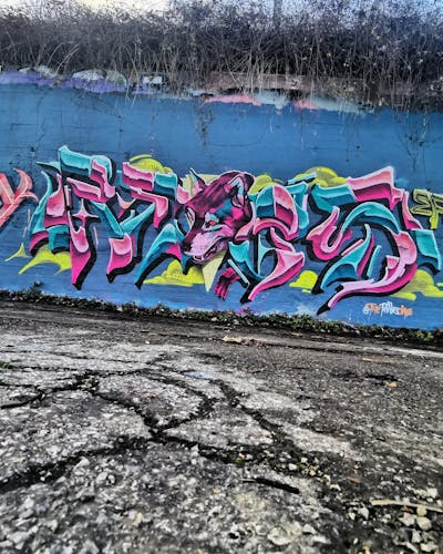 Coralle and Cyan Stylewriting by REVES ONE. This Graffiti is located in United Kingdom and was created in 2024. This Graffiti can be described as Stylewriting and Characters.