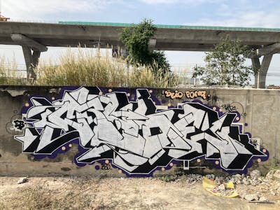 White and Black Stylewriting by Crude. This Graffiti is located in Bangkok, Thailand and was created in 2021. This Graffiti can be described as Stylewriting and Abandoned.