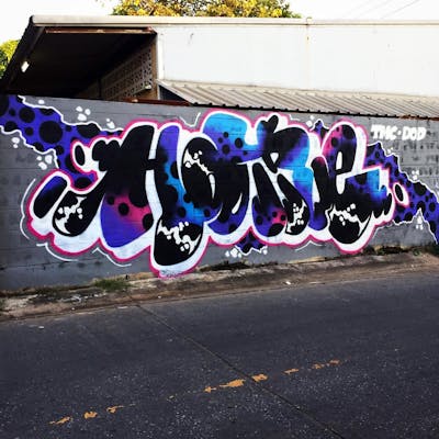 Colorful Stylewriting by DOD crew, Hootive and TMC. This Graffiti is located in Thailand and was created in 2022.