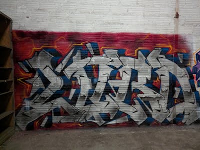 Chrome and Blue and Red Stylewriting by LORD. This Graffiti is located in Caen, France and was created in 2024. This Graffiti can be described as Stylewriting and Abandoned.