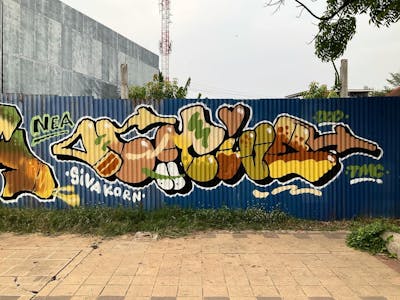 Beige and Brown Stylewriting by Hootive. This Graffiti is located in Thailand and was created in 2024. This Graffiti can be described as Stylewriting and Street Bombing.