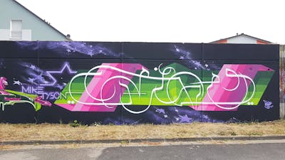 Colorful Wall of Fame by urine and OST. This Graffiti is located in Wiesbaden, Germany and was created in 2019. This Graffiti can be described as Wall of Fame, Stylewriting and Handstyles.