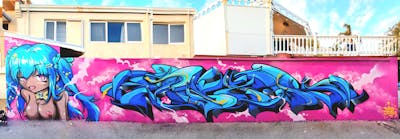 Light Blue and Coralle Stylewriting by DEVOS and TexR. This Graffiti is located in Australia and was created in 2022. This Graffiti can be described as Stylewriting and Characters.