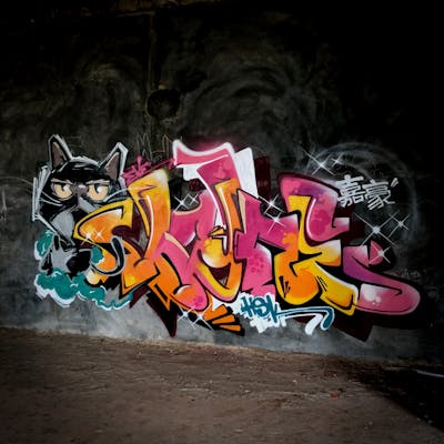 Coralle and Orange Stylewriting by VAYNE3 and HSK. This Graffiti is located in Batam, Indonesia and was created in 2022. This Graffiti can be described as Stylewriting and Characters.
