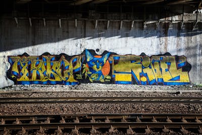 Light Green and Light Blue and Yellow Stylewriting by Nan, TWESO and RIGEL. This Graffiti is located in Moscow, Russian Federation and was created in 2016. This Graffiti can be described as Stylewriting, Characters and Line Bombing.