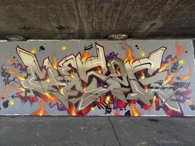 Beige and Colorful Stylewriting by omseg. This Graffiti is located in Freiburg, Germany and was created in 2022. This Graffiti can be described as Stylewriting and Wall of Fame.