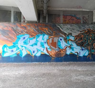 Colorful and Cyan Stylewriting by Ruin and Marc Sund. This Graffiti is located in augsburg, Germany and was created in 2023. This Graffiti can be described as Stylewriting, Characters and Wall of Fame.