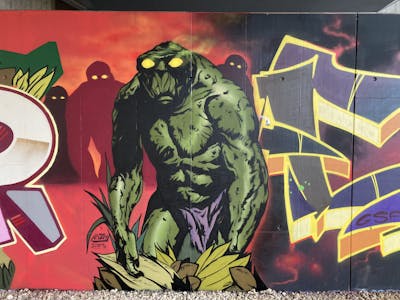 Colorful and Green Characters by Curt. This Graffiti is located in Regensburg, Germany and was created in 2023.