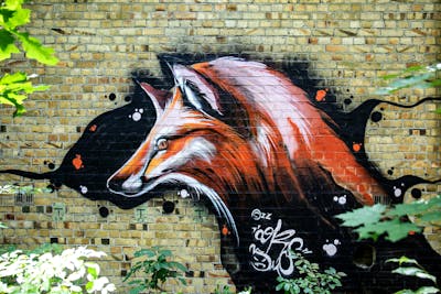 Black and Orange Characters by Cors One. This Graffiti is located in Berlin, Germany and was created in 2022. This Graffiti can be described as Characters and Abandoned.