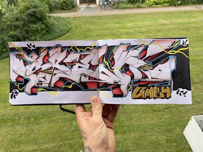 Coralle and Colorful Blackbook by Srek. This Graffiti is located in Germany and was created in 2023. This Graffiti can be described as Blackbook.