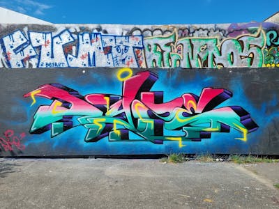 Colorful and Cyan and Red Stylewriting by Dyze. This Graffiti is located in Switzerland and was created in 2023. This Graffiti can be described as Stylewriting and Wall of Fame.
