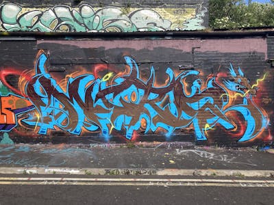 Light Blue and Brown Stylewriting by Micro79. This Graffiti is located in Newcastle upon Tyne, United Kingdom and was created in 2022. This Graffiti can be described as Stylewriting and Wall of Fame.